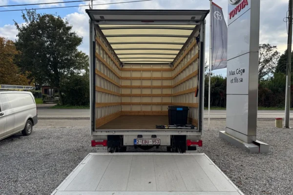 Camion Man ouvert portant le logo GégoLoc